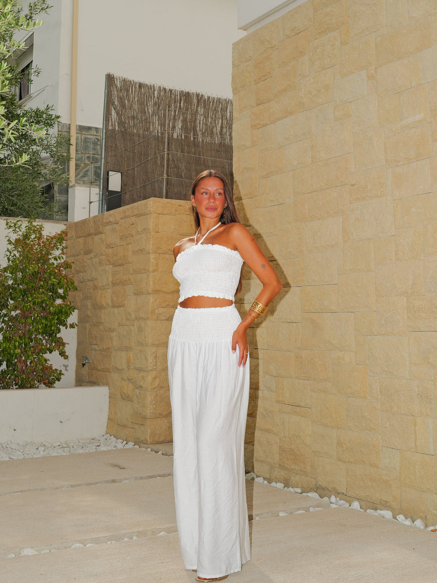 Conjunto de top e calças largas com padrão de ninho, branco